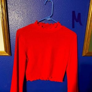 Red crop top with long sleeves